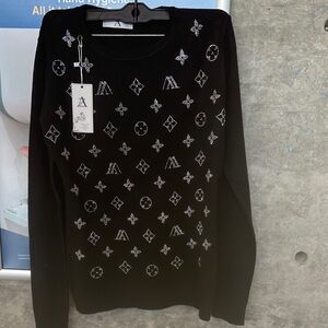 Chic Black Sweater with Silver Patterns